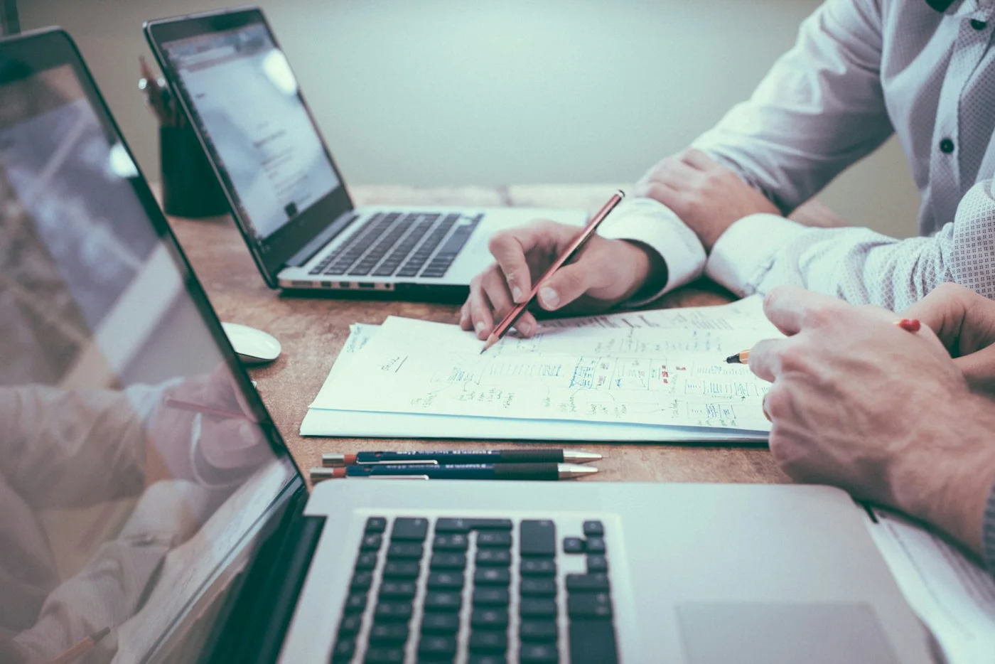 Professionals reviewing a business plan